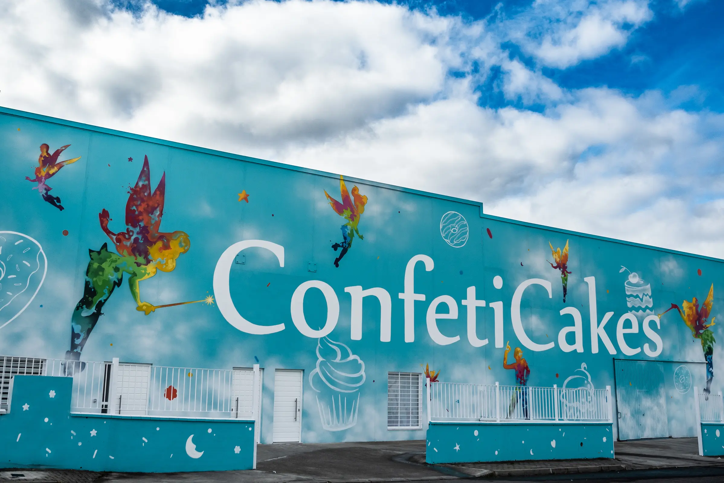 ConfetiCakes facilities with the illustrated turquoise facade