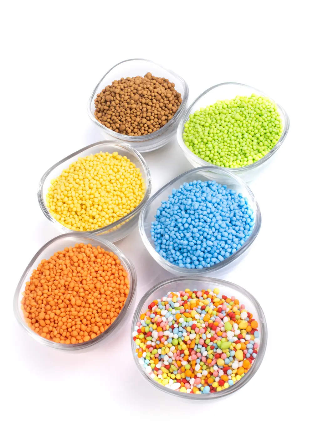 Bowls filled with colourful ConfetiCakes sugar decorations