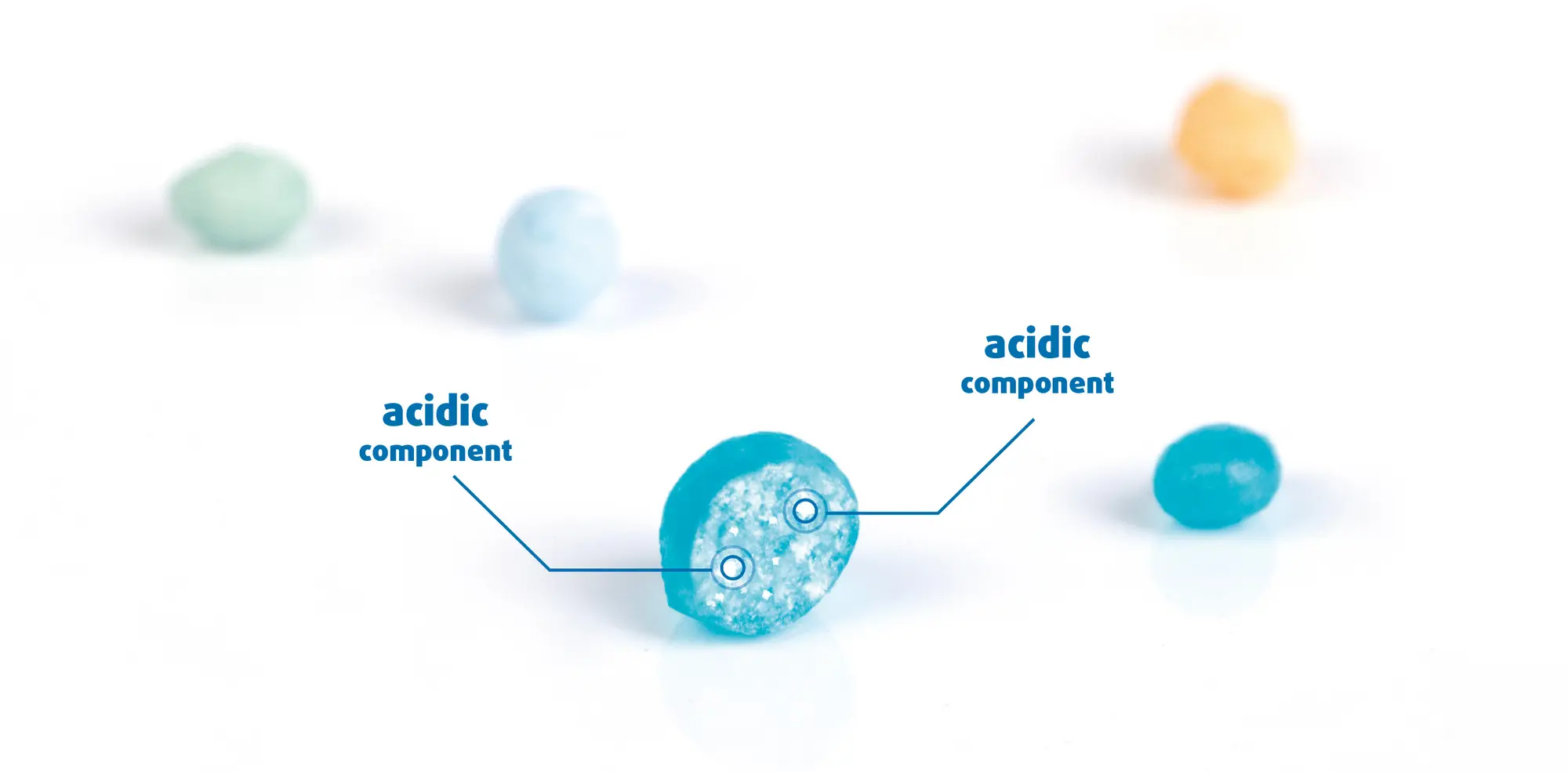 Cross-section of a blue Crunchy Pearl showing its acidic component