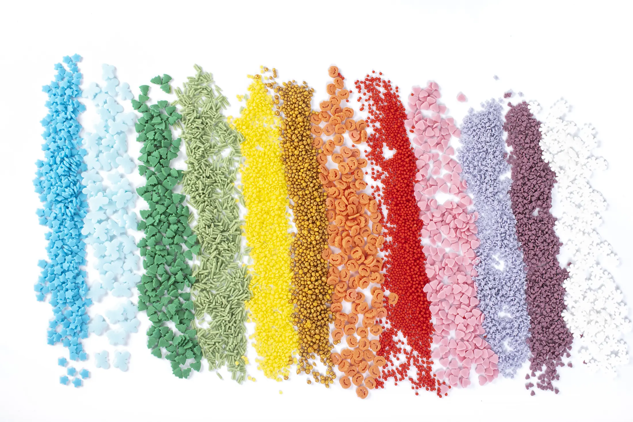 Colourful sugar shapes arranged in bands